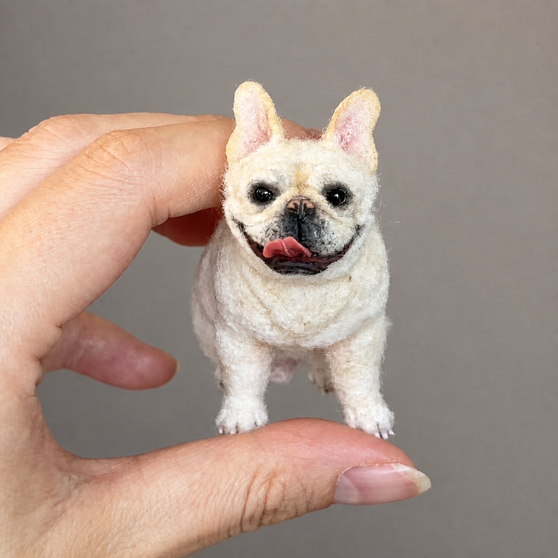 Handmade French bulldog mini full body wool felt figurine held by hand